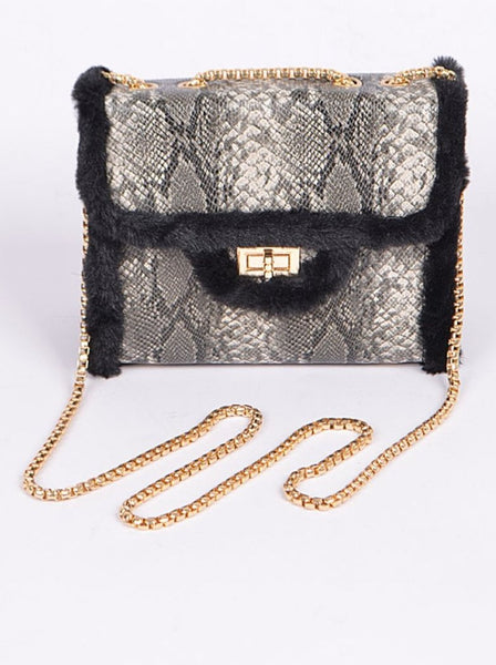 Faux snakeskin clutch