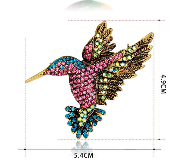 Studded bird brooch