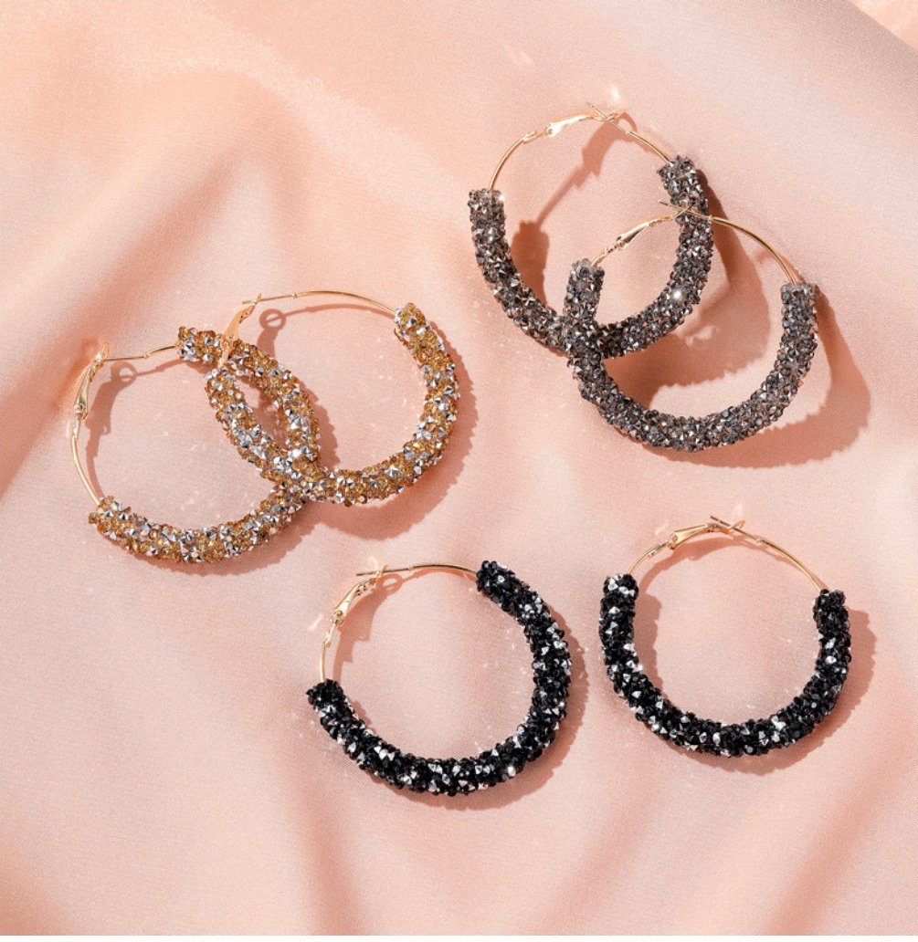 Hoop earrings with rhinestones